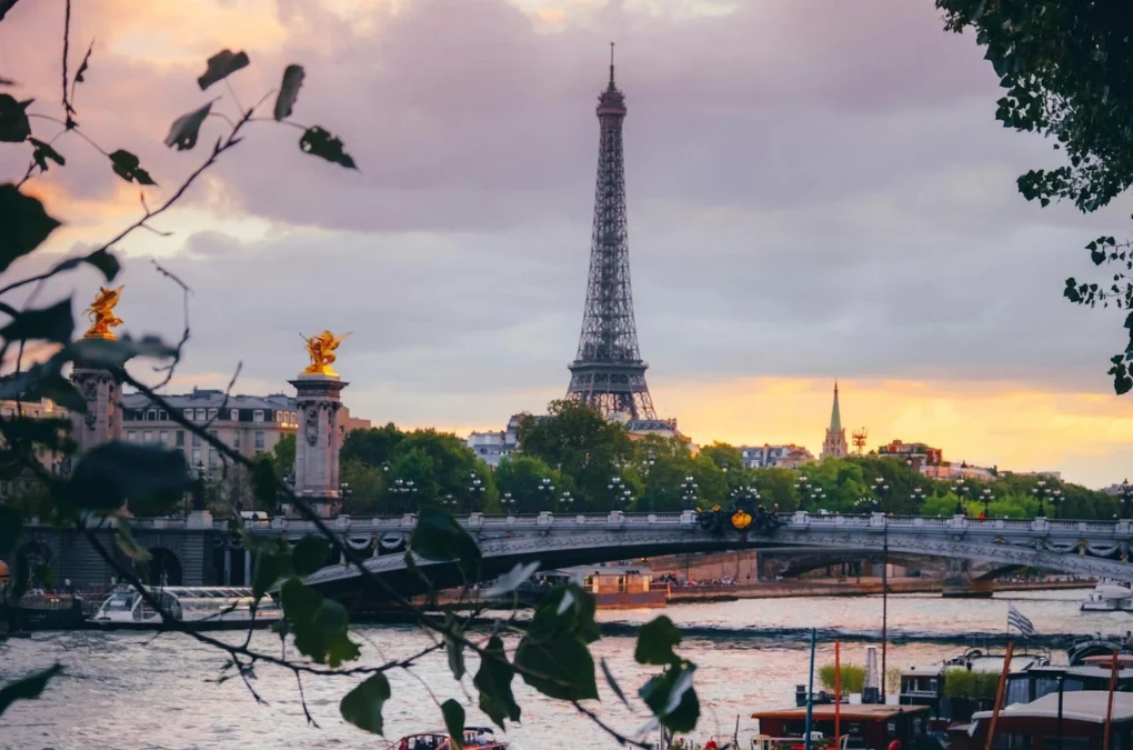 A view of the Eiffel Tower, highlighting its intricate structure and hinting at hidden spaces for surprising global landmark facts.
