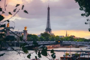 A view of the Eiffel Tower, highlighting its intricate structure and hinting at hidden spaces for surprising global landmark facts.