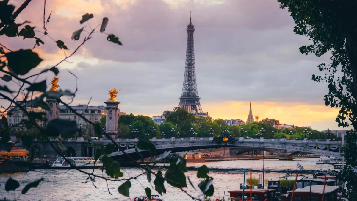A view of the Eiffel Tower, highlighting its intricate structure and hinting at hidden spaces for surprising global landmark facts.